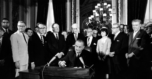 United States President Lyndon B. Johnson signed the Voting Rights Act into law featured image - LankaTricks
